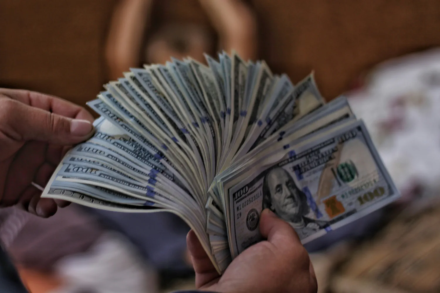 image title Cash flowing as dividend income, representing getting paid to hold a stock